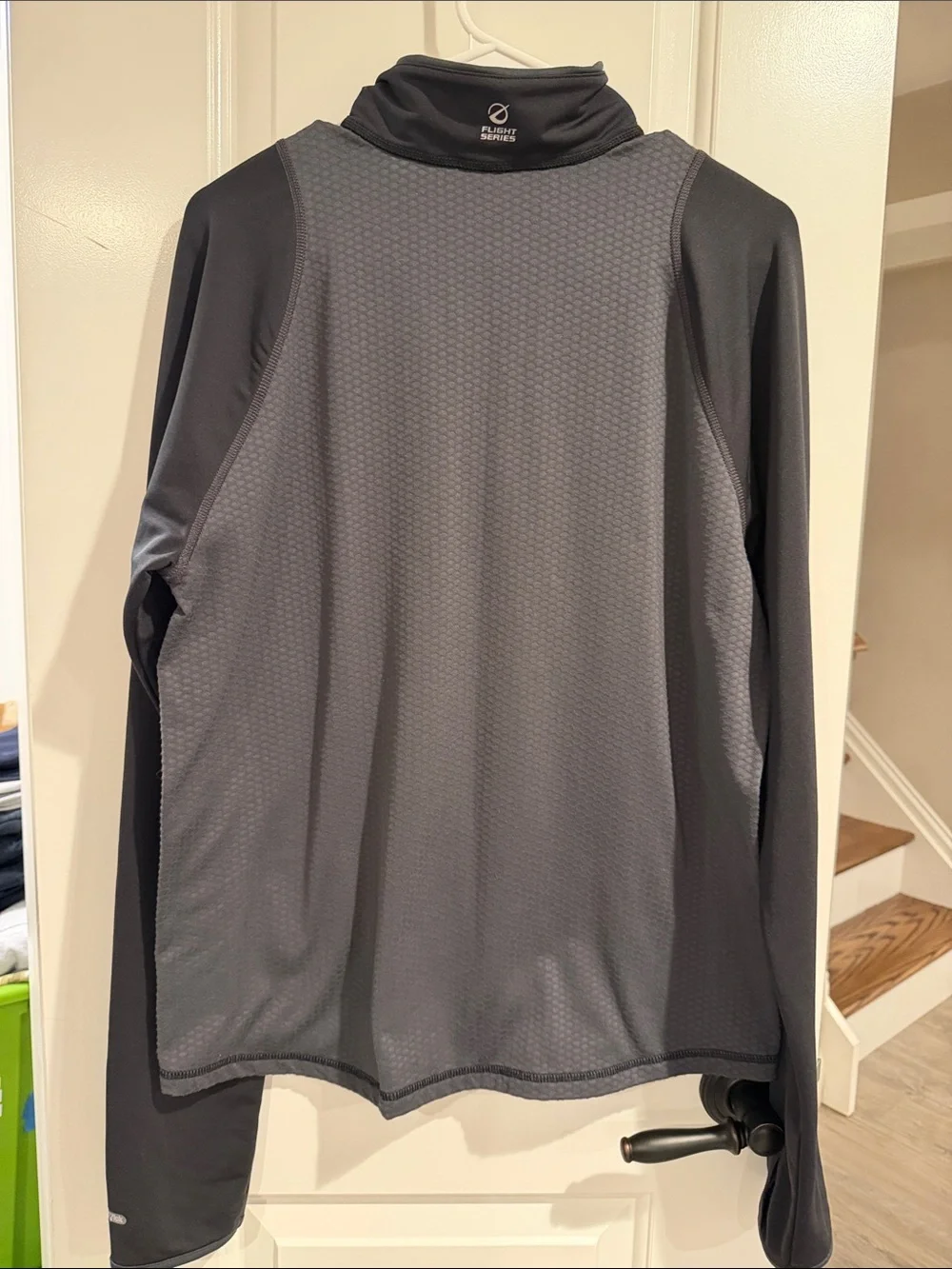 The North Face Men’s Black Long-Sleeve Half-Zip base layer
